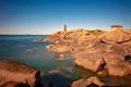Lighthouse of Ploumanach at the golden hour in Perros-Guirec CÃÂ´tes d`Armor, Brittany, France