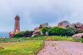 Lighthouse of Ploumanach Mean Ruz in Perros-Guirec on Pink Granite Coast, Brittany (Bretagne), France Royalty Free Stock Photo