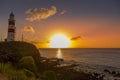 The Lighthouse of Pointe aux Caves Albion at sunset.