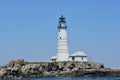 Lighthouse on a Rock Ledge in Boston Harbor Royalty Free Stock Photo