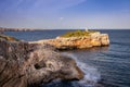 Lighthouse on rocks with sea and waves. Sunny day with blue sky. Porto Cristo, Mallorca, Spain Royalty Free Stock Photo