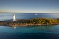 Lighthouse and sail ship at the tip of Paradise Island in Nassau, Bahamas