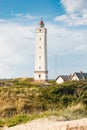 Lighthouse in the sand dunes on the beach of Blavand, Jutland Denmark Europe Royalty Free Stock Photo