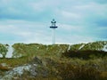 Lighthouse and sand dunes in Dueodde, Bornholm, Denmark Royalty Free Stock Photo