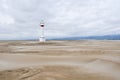 Lighthouse and sand dunes in Punta del Fangar (Spain) Royalty Free Stock Photo