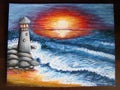 Lighthouse searchlight beam through marine air at night Royalty Free Stock Photo