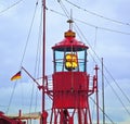 Lighthouse ship in harbor Royalty Free Stock Photo