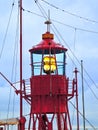 Lighthouse ship in harbor Royalty Free Stock Photo