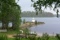 Lighthouse on the shore of lake Royalty Free Stock Photo