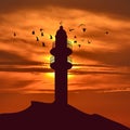 Lighthouse silhouette and birds flying around it