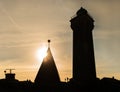 Lighthouse silhouette in sunset Royalty Free Stock Photo