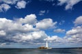 Lighthouse at the small island near the coast