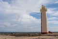 Lighthouse standing at the beach touching the sky in Bonaire, Caribbean Royalty Free Stock Photo