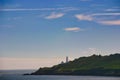 The lighthouse of Start Point at the seaside with cliffs, Devon, England