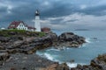 Lighthouse in stormy clouds. Royalty Free Stock Photo