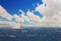 Lighthouse in the stormy sea at Simons Town