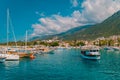 Lighthouse on a sunny morning with fishing boats at the harbor of Kas Turkey Royalty Free Stock Photo