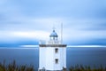 Lighthouse at sunset with clouds in the sky blue Spain Royalty Free Stock Photo