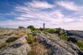 Lighthouse in the Swedish village Landsort on the island of Oja against the backdrop of a beautiful sky with clouds Royalty Free Stock Photo