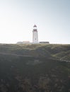 Lighthouse on top of the mountain on a sunny day Royalty Free Stock Photo