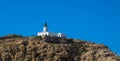 The lighthouse on the top of the red granit La Pietra islands, L`ÃÅ½le-Rousse, Corsica