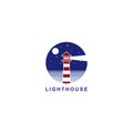 Logo design lighthouse, the lighthouse with a beach background at night Royalty Free Stock Photo