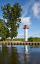 Lighthouse at the Uecker river in Ueckermunde on a sunny day, Germany Royalty Free Stock Photo