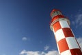 Lighthouse Under a Deep Blue Sky