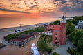 Lighthouse in Ustka by the Baltic Sea at sunrise, Poland Royalty Free Stock Photo