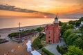 Lighthouse in Ustka by the Baltic Sea at sunrise, Poland Royalty Free Stock Photo