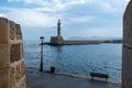 Lighthouse at Venetian harbour of the Old Town of Chania Crete, Greece. View from Firkas Fortress