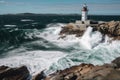 lighthouse, with view of the open sea, waves crashing against the rocks Royalty Free Stock Photo