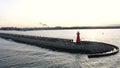 Lighthouse on the west breakwater in Nowy Port at sunset, GdaÃâsk.