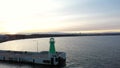 Lighthouse on the west breakwater in Nowy Port at sunset, GdaÃâsk.