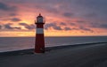 Lighthouse Westkapelle at sunset in red