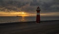 Lighthouse Westkapelle with ship at sunset