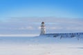 Lighthouse in winter Royalty Free Stock Photo