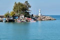 Lighthouses and fishing boats at Akcakoca harbor in Duzce province, Turkey