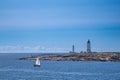 Lighthouses and sailboat on an archipelago island in Norway