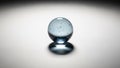 The lighting accentuates the transparency and round shape of the sphere Royalty Free Stock Photo