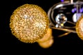 Lighting balls on the golden chandelier in the lamplight, Lamps on the dark background. Close-up Royalty Free Stock Photo