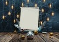 Lighting bulbs hanging on blue grunge wall with empty photo frame. Royalty Free Stock Photo