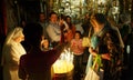 Lighting a Candle in the Church of Holy Sepulchre Royalty Free Stock Photo