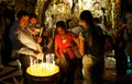 Lighting a Candle in the Church of Holy Sepulchre II Royalty Free Stock Photo