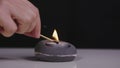 Lighting a candle in slow motion