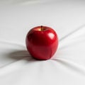 The lighting casts a soft shadow emphasizing the apple s roundness Royalty Free Stock Photo