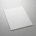 The lighting casts soft shadows highlighting the paper s smoothness and edges Royalty Free Stock Photo
