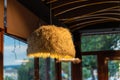 The lighting chandelier is covered with sheep wool of light color.
