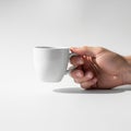 The lighting creates a soft shadow on the surface beneath the mug Royalty Free Stock Photo