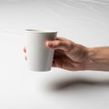 Lighting creates a subtle shadow beneath the cup adding depth to the Royalty Free Stock Photo